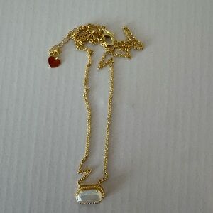 Elegant Gold Necklace with Charm
